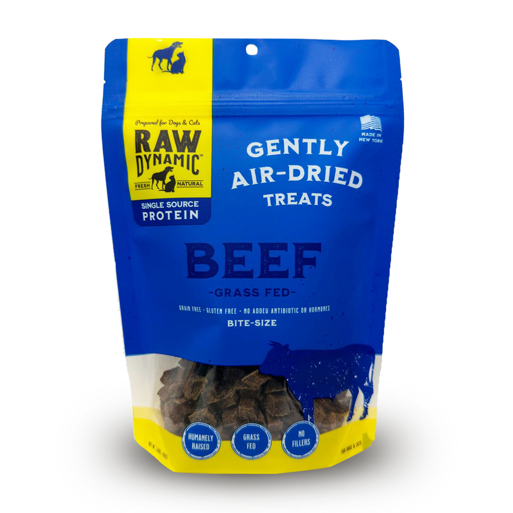 Blue packaging for Raw Dynamic's air-dried beef treats for dogs and cats, marked as grass-fed, grain-free, and bite-sized.