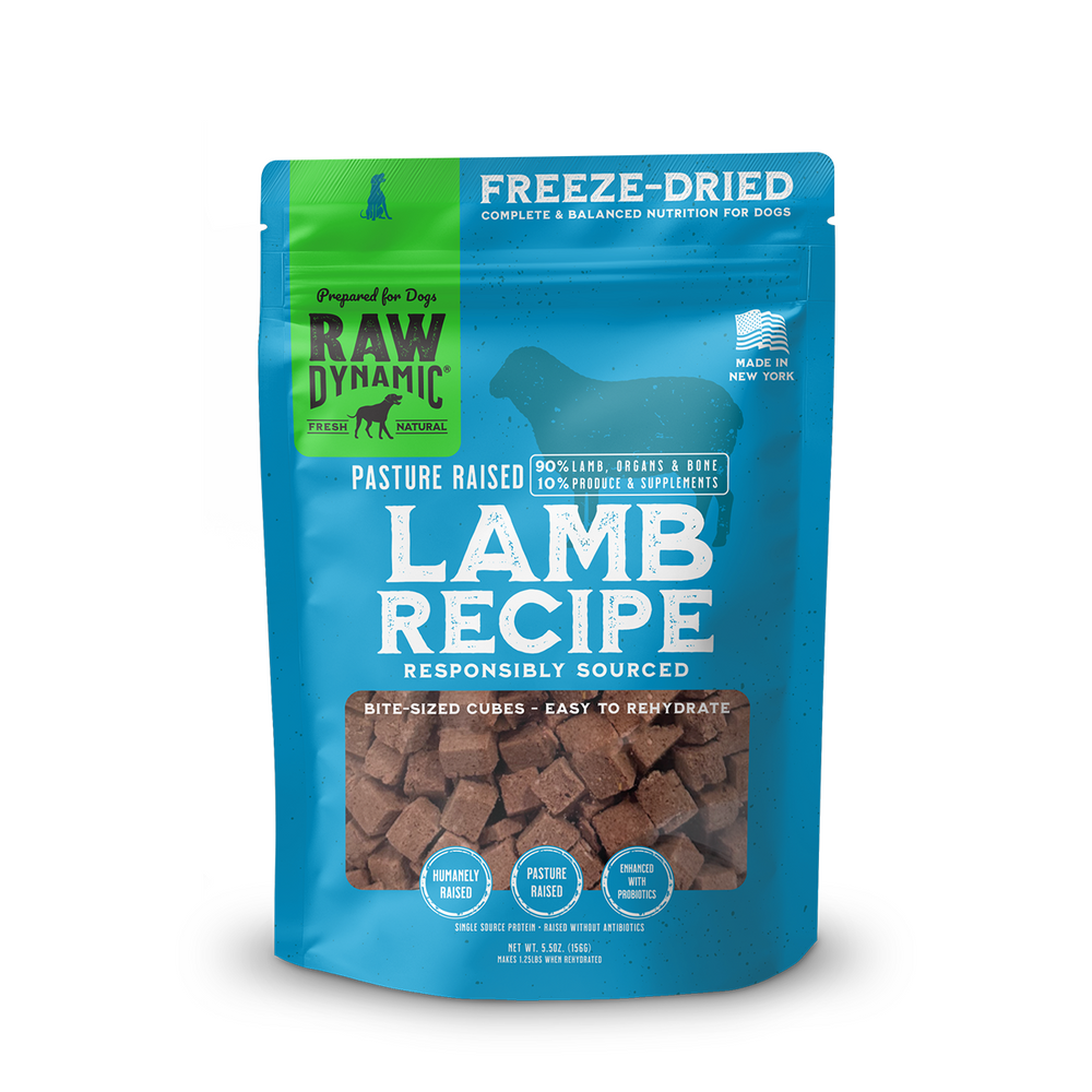 Blue bag of Raw Dynamic freeze-dried lamb dog food featuring bite-sized cubes, labeled as pasture-raised and responsibly sourced.