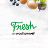 fresh by Wooftown written on top of a background of light wood and blueberries eggs and kale