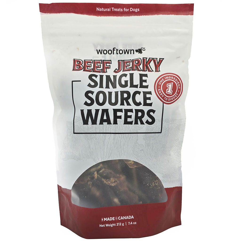 Bag of Wooftown Beef Jerky Single Source Wafers for dogs, featuring red and white packaging and a net weight of 212 grams.
