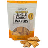 A bag of Wooftown Chicken Single Source Wafers dog treats, with several treats displayed in front, emphasizing natural ingredients.