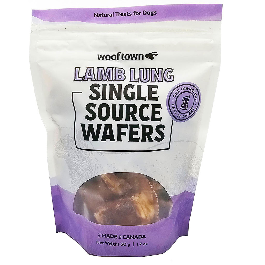 Package of Wooftown Lamb Lung Single Source Wafers, a natural dog treat, weighing 50g, with a purple and white design.