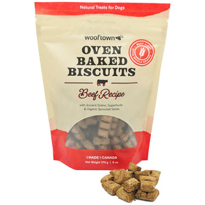 A bag of Wooftown beef oven-baked dog biscuits, with a few biscuits displayed outside, highlighting bite size treats