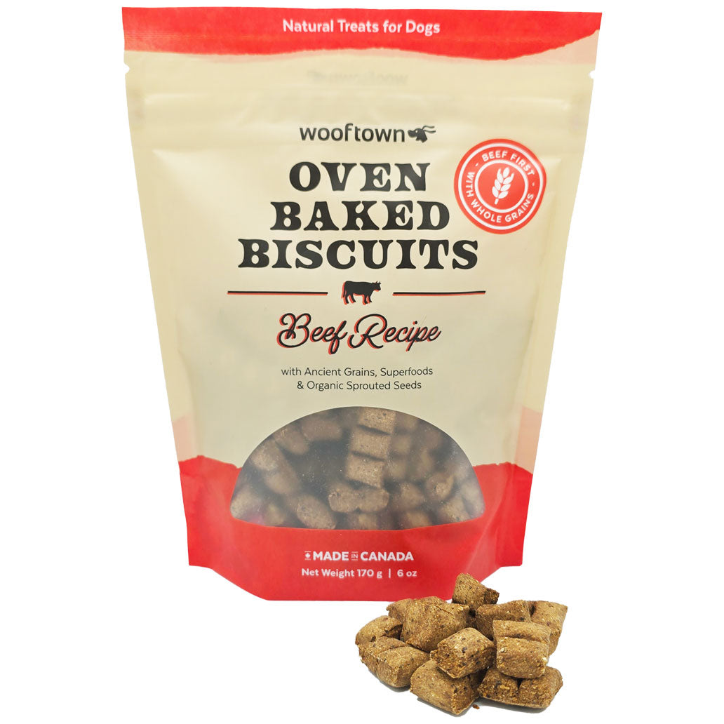 A bag of Wooftown beef oven-baked dog biscuits, with a few biscuits displayed outside, highlighting bite size treats